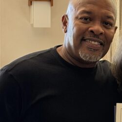 Dr. Dre smiling in a black shirt in March 2026