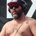bert kreischer net worth: the $20m estimate tested 10 bert kreischer wearing a headset at the 2023 daytona 500