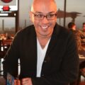 Jo Koy smiling during a visit to Camp Pendleton in November 2011