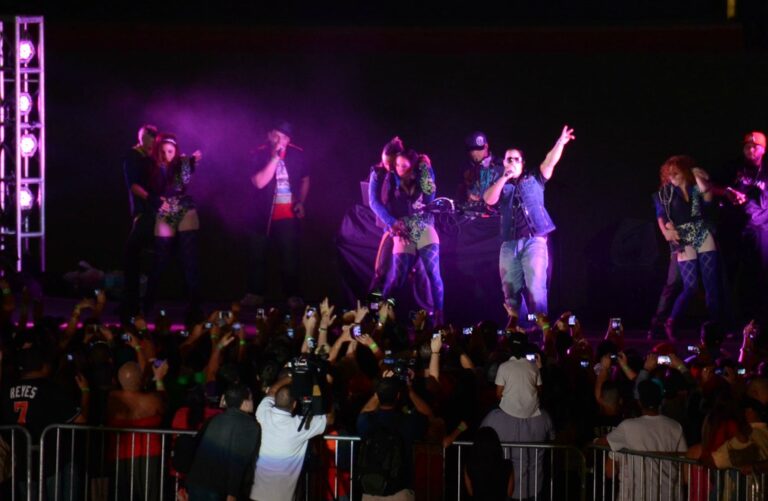 daddy yankee performing with a microphone at marlins park in an archival april 2012 concert photograph