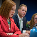 jen psaki in the left foreground during a state department twitter q&a in april 2014, with two colleagues behind her.
