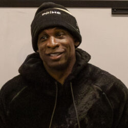 Deion Sanders wearing a Coach Prime knit cap in Boulder in January 2024