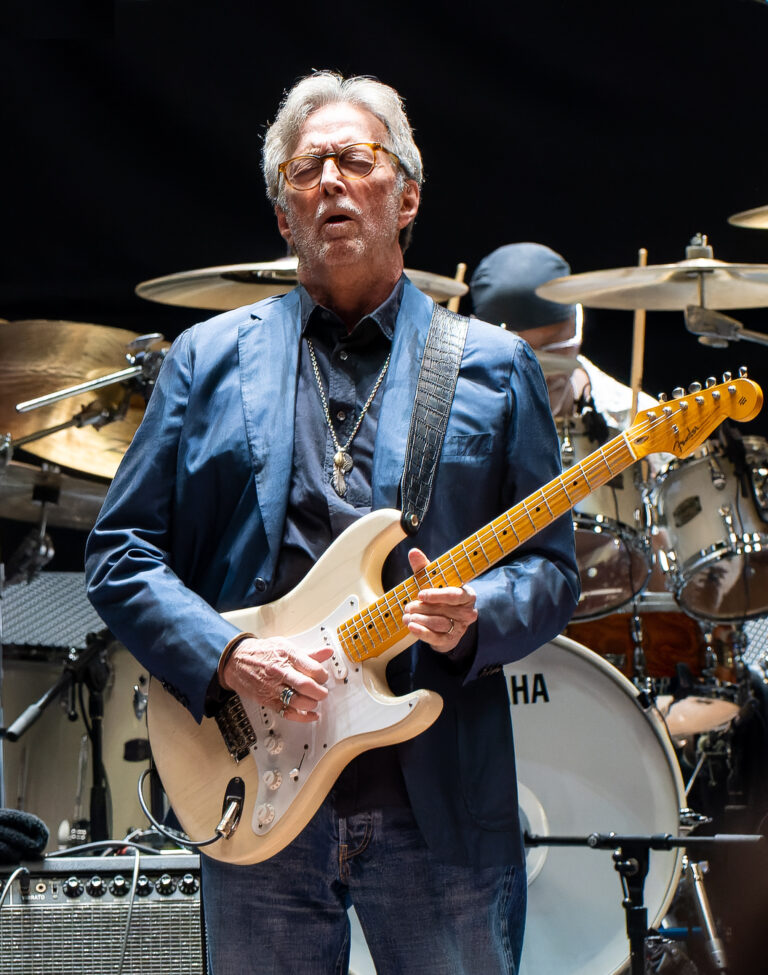 eric clapton net worth: catalog, auctions & 2026 1 eric clapton performing with a guitar at the royal albert hall in 2023