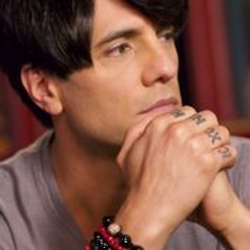 Criss Angel in a studio headshot