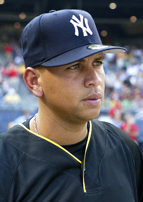 alex rodriguez in a yankees cap and black baseball jersey, photographed in 2006